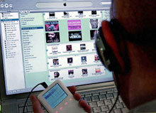 Apple est leader de la musique numérique avec ses lecteurs iPod et son magasin de musique en ligne iTunes.(Photo : AFP)