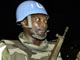Des patrouilles conjointes des forces armées ivoiriennes et de l'ONU ont été formées pour la sécurisation d'Abidjan. Le contingent international a été le témoin impuissant des exactions dénoncées par le rapport de la commission d'enquète.(Photo : AFP)
