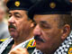 11 responsables de l'ancien régime doivent être jugés à partir de la semaine prochaine. Parmi eux Ali le Chimique (G) et Taha Yassin Ramadan.(Photo : AFP)