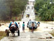Route submergée par les eaux du typhon Nanmadol. 

		(Photo: AFP)
