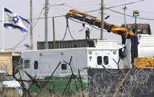 L'armée israélienne a commencé à retirer de la bande de Gaza du matériel logistique.(Photo : AFP)