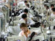 En Chine, 80 % des entreprises privées ne signent aucun contrat à leurs employés.(Photo: AFP)