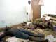 Des corps sont entassés dans un chambre à Duékoué, le 2 juin 2005.(Photo : AFP)