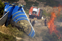 Au contact du sol, l'avion a littéralement explosé, seule la queue de l'appareil a été retrouvée étonnamment indemne.(Photo: AFP)
