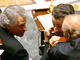 Dominique de Villepin, en conversation avec le ministre de l'Intérieur Nicolas Sarkozy et le ministre aux Collectivités locales Brice Hortefeux le 22 mars à l'Assemblée nationale.(Photo: AFP)