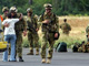 A leur arrivée les soldats australiens sont salués par la population. 

		(Photo : AFP)