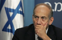 Ehud Olmert. Le Premier ministre israélien a clairement voulu manifester la puissance d’Israël et sa détermination à ne pas se laisser intimider ou menacer. 

		(Photo: AFP)