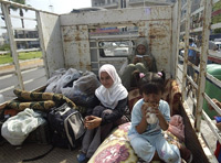 Selon l'Unicef, le nombre de Libanais contraints de quitter leur foyer pour fuir les combats s'élève à un demi million. 

		(Photo : AFP)