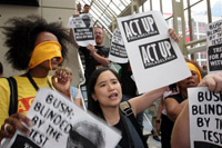 Des associations de défense des malades du sida comme Act Up dénoncent la politique américaine de la lutte contre l'épidémie. 

		(Photo : AFP)