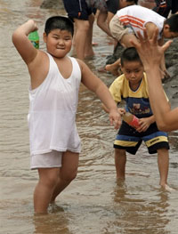 En Chine, l'obésité gagne du terrain en raison de la politique de l'enfant unique et des changements alimentaires. 

		(Photo : AFP)