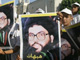 Bethléhem, le 7 août. De jeunes Palestiniens brandissent le portrait d'Hassan Nasrallah lors d'une manifestation contre les opérations militaires israéliennes au Liban et dans la bande de Gaza.(Photo : AFP)