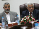 Le président de l'Autorité palestinienne Mahmoud Abbas (à droite) et le Premier ministre Ismaël Haniyeh (à droite) à Gaza, lundi 11 septembre. Un accord a été conclu entre le Fatah et le Hamas en vue de former un gouvernement d'union nationale.  

		(Photo : AFP)
