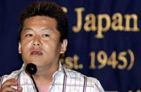 Takafumi Horie, le 4 septembre devant le tribunal de Tokyo: «<i>Je déplore ma mise en accusation</i>». 

		(Photo: AFP)