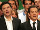 Nicolas Sarkozy (au centre) a lancé sa campagne lors de l'université d'été de l'UMP et a cloturé son discours en chantant la Marseillaise. 

		(Photo : AFP)