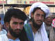 A l'entrée du Kandahari Bazar, un des plus fréquenté de Quetta, Pakistanais et Afghans se mélangent. 

		(Photo : Claire Billet/RFI)