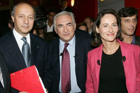 Les trois candidats à la candidature du PS au Zénith de Paris le 26 octobre 2006 (de gauche à droite) Laurent Fabius, Dominique Strauss-Kahn et Ségolène Royal. 

		(Photo : AFP)