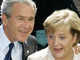 Angela Merkel et George W. Bush. 

		(Photo : AFP)