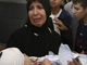 Une femme de Beit Hanoun avec son enfant blessé. 

		(Photo : AFP)