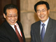 L'émissaire nord-coréen, Kim Kye-Gwan (à gauche), en compagnie du vice-ministre chinois des Affaires étrangères, Wu Dawei. 

		(Photo : AFP)