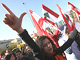 A Beyrouth, les manifestants ont participé à un rassemblement devant une branche du ministère des Finances chargée des impôts. 

		(Photo: AFP)