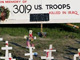 Alors que  George W. Bush annonce une augmentation des troupes en Irak, le poids de la guerre devient trop lourd pour de plus en plus d'Américains. 

		(Photo : AFP)