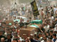 Obsèques, lundi 21 mai, de neuf Palestiniens tués par un raid israélien sur Gaza. 

		(Photo : Reuters)
