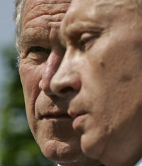 George W. Bush et Vladimir Poutine au Sommet du G8. 

		(Photo : Reuters)