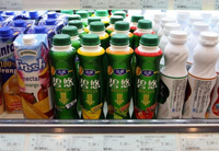 Danone et Wahaha, premier fabricant de boissons chinoises, créent conjointement une société à capitaux mixtes pour la production et la vente de nourritures et boissons pour enfants. &#13;&#10;&#13;&#10;&#9;&#9;(Photo : AFP)
