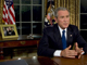 George W. Bush dans son bureau ovale de la Maison Blanche, juste après son allocution télévisée. C'était la 8e fois que le président américain intervenait sur l'Irak.  

		( Photo : AFP )