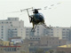 Un hélicoptère de la société militaire privée Blackwater, survolant Bagdad.(Photo : AFP)