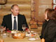 Le président russe Vladimir Poutine et sa femme Lioudmila, dans un restaurant à Moscou, le 2 décembre 2007.(Photo : Reuters)