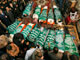 Une prière a lieu aux côtés des corps des Palestiniens, tués lors d'un raid israélien le mardi 15 janvier 2008.(Photo : Reuters)