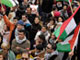 Des manifestants de la gauche Israélienne au poste-frontière d'Erez.(Photo: Reuters)