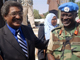 L'ambassadeur soudanais auprès de l'ONU Abdulmahmud Mohamed et le général Martin Luther Agwai, commandant de la Minuad, après la signature d'un accord sur les conditions d'intervention de la Minuad, samedi 9 février à Khartoum.( Photo : AFP )