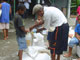 Distribution de riz et d'huile organisée dans un camps de réfugiés.(Photo : S. Honorine/RFI)