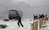 Des affrontements entre la police chinoise et des manifestants ont eu lieu à Lhassa le 14 mars.(Photo : AFP)
