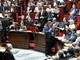 Le ministre de l'Ecologie Jean-Louis Borloo (au centre) présente le projet de loi sur les OGM à l'Assemblée nationale.(Photo : AFP)