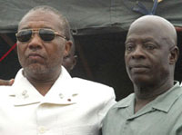 Charles Taylor et Moses Blah en 2003.(Photo : AFP)