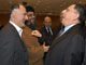 Une partie du nouveau gouvernement libanais : le ministre du Travail, Mohammed Fneich (g) ; le président du Hezbollah Hassan Nasrallah (c) et le Premier ministre Fouad Siniora (d).(Photo : AFP/2006)