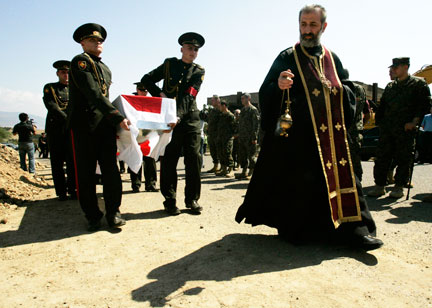 Le 28 août 2008 à Tbilissi, funérailles de soldats géorgiens tués dans le conflit d'Ossétie du Sud. (Photo: Reuters)