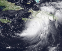 L'ouragan Gustav: ici, sur Haïti et Saint-Domingue, le 26 août 2008. Il devrait se diriger ensuite vers Cuba et la Jamaïque.(Photo : AFP)