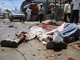 Des corps de civils gisant dans la rue, suite aux fusillades du marché de Bakara, à Mogadiscio.(Photo : Reuters)