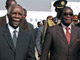 Le président sud-africain (g), Thabo Mbeki, et son homologue zimbabwéen (d), Robert Mugabe.(Photo : AFP)