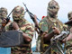 Des rebelles du Mend préparant une attaque, dans le delta du Niger, le 17 septembre 2008.(Photo : AFP)