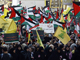 Manifestation des partisans du hezbollah libanais brandissant des drapeaux palestiniens à Beyrouth, le 19 décembre 2008.( Photo : Joseph Barrak / AFP )