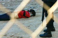 Le corps sans vie de cette femme, non identifiée, a été retrouvé le 28 novembre 2008 dans la ville mexicaine de Juarez. Sa mort serait liée à une dispute entre les cartels de la drogue.(Photo : AFP)
