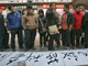 Une bannière contre Nicolas Sarkozy devant le Carrefour de Chongqinq, le 8 décembre 2008.( Photo : Reuters )