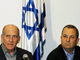 Le Premier ministre israélien Ehud Olmert  (G) et Ehud Barak, le ministre de la Défense à Tel Aviv, le 27 décembre 2008. (Photo : Reuters)