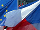 Le drapeau tchèque (au premier plan) flottant avec le drapeau européen et ceux des autres pays membres, à Bruxelles.(Photo : Reuters)