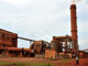 La Guinée possède les plus grandes réserves au monde de bauxite, un minerai servant à fabriquer l’aluminium. (Usine de bauxite située à Kamsar, au nord de Conakry).(Photo : AFP)